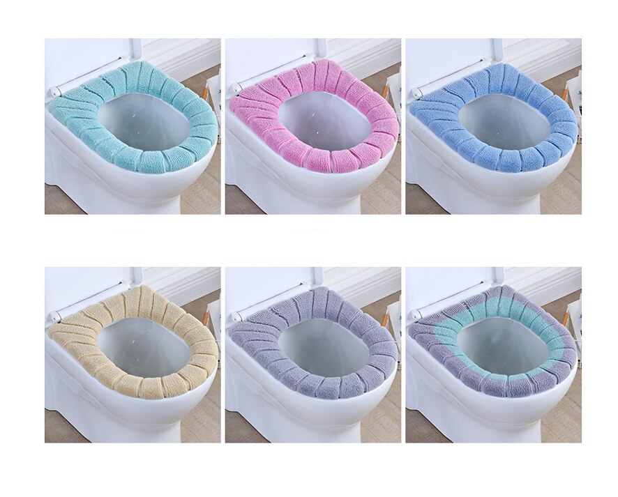 La couverture confortable de siège de toilette est des articles sanitaires chauds, doux et réutilisables de flanelle