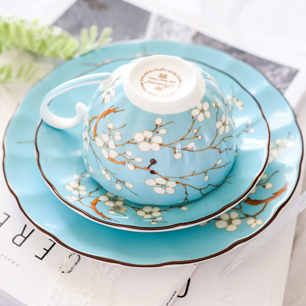Grado Superior hueso taza de café de China conjunto británico a la hora del té por la tarde de porcelana tazas de té y platillos postre placa plana de de té