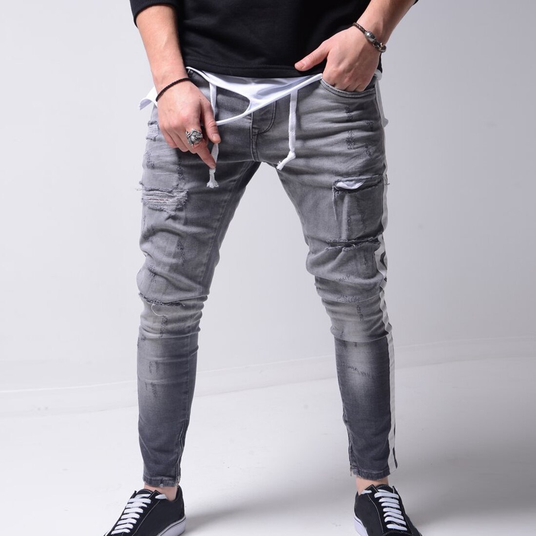 Pantalones pitillo rasgados para Hombre, pantalones vaqueros ajustados con rayas laterales para motociclista, pantalones vaqueros rasgados con agujeros estilo Hip Hop para Hombre