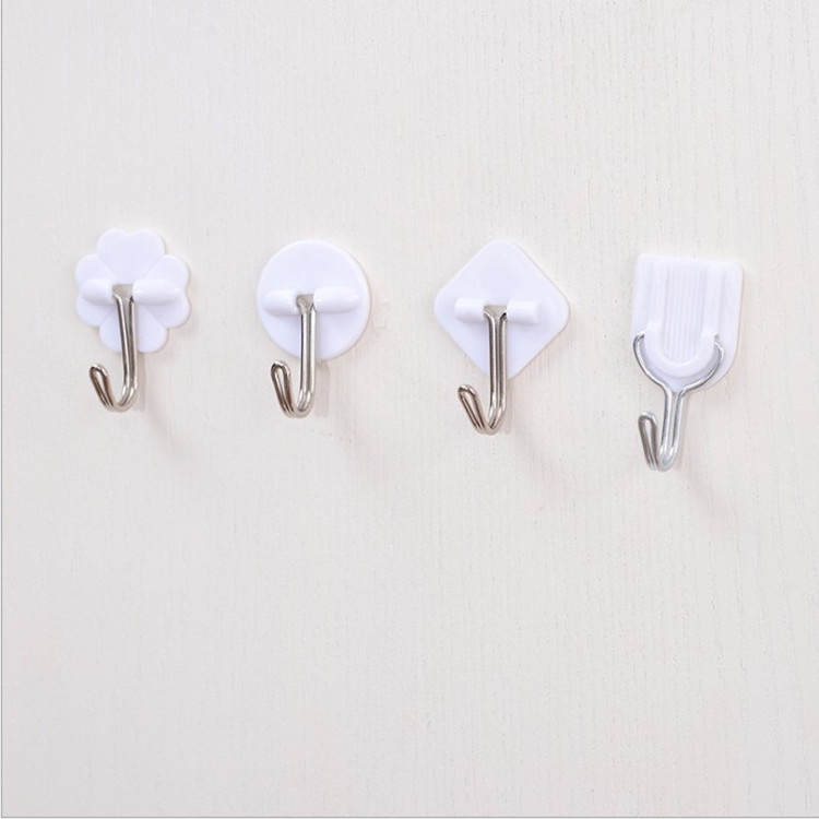 Gancho pequeño de trompeta de plástico blanco de dibujos animados, fuerte adhesivo para cocina, accesorios de baño, toalla, bolso de mano, colgador de pared, 1 ud.