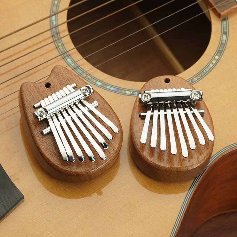 Kalimba de poche portable à 8 touches en métal, piano à pouces, jouets musicaux, réduction de la pression, intérieur du maire, pour enfants et adultes