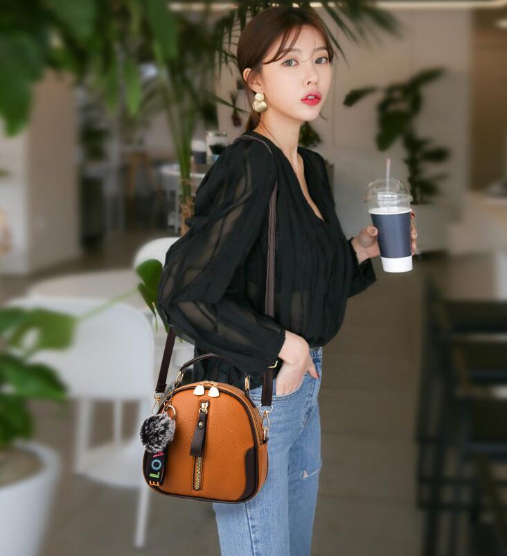 Effen damestas, draagbare schoudertas van pu-leer met grijze haarbal