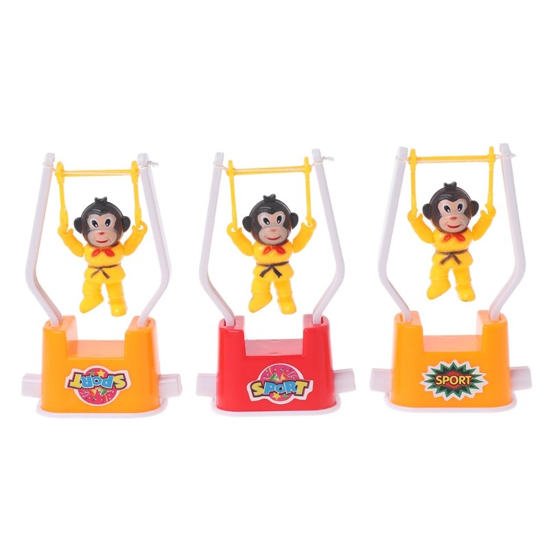 Novedad mono Animal juguetes de gimnasia artísticos dibujos animados viento juguete niños juguete