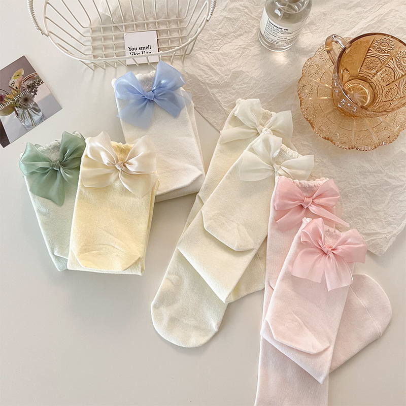 Calcetines de princesa con lazo para mujer, medias de tubo medio de Color sólido para primavera y verano, bonitos calcetines de tubo decorados con lazos,