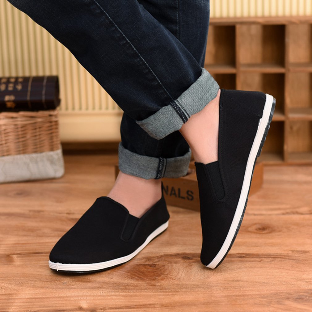 Enkele antislip zwarte stoffen schoenen met platte zool slijtvaste beschermende schoenen werkschoenen voor chauffeurs