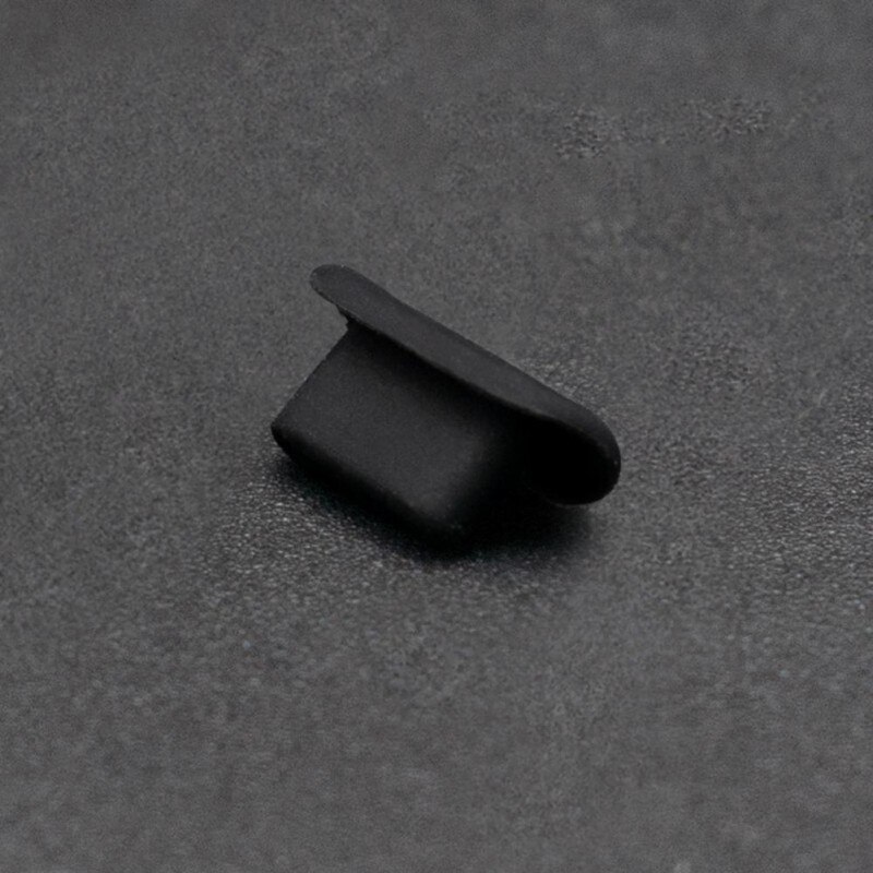 Portable mini metal charger port stopper phone dust plug for apple iphone series mobile phone accessories dustproof cover: Silicone black