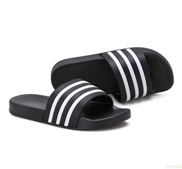 Chanclas de goma EVA para hombre y mujer, zapatos informales de rayas blancas y negras suaves, para verano