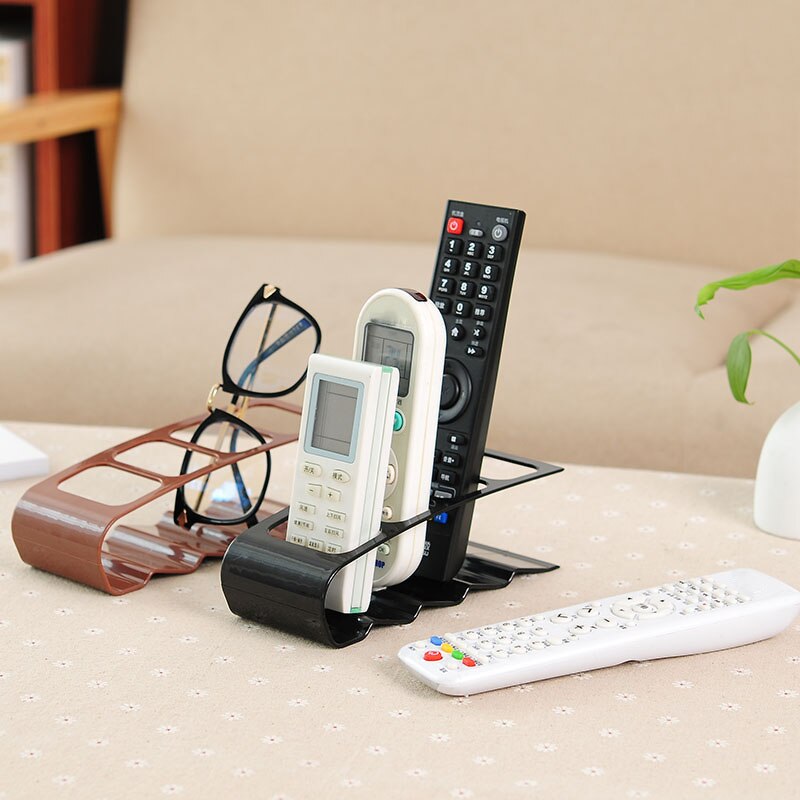 Soporte de plástico para TV, DVD, práctico marco de cuatro mandos a distancia, soporte para teléfono móvil, estante de hasta 4 unidades
