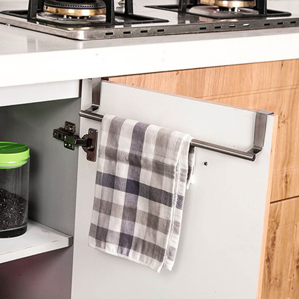Hjem badeværelse køkken skab over døren hængende metal håndklædeholder holder bøjlehylde
