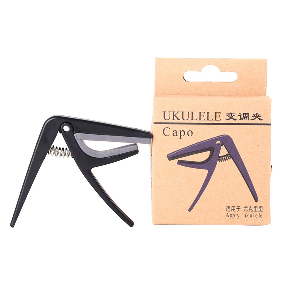 Ukulele capo 4 strenge hawaii guitar capoer enkelthånds hurtigskift ukelele capo guitar dele & tilbehør: Default Title
