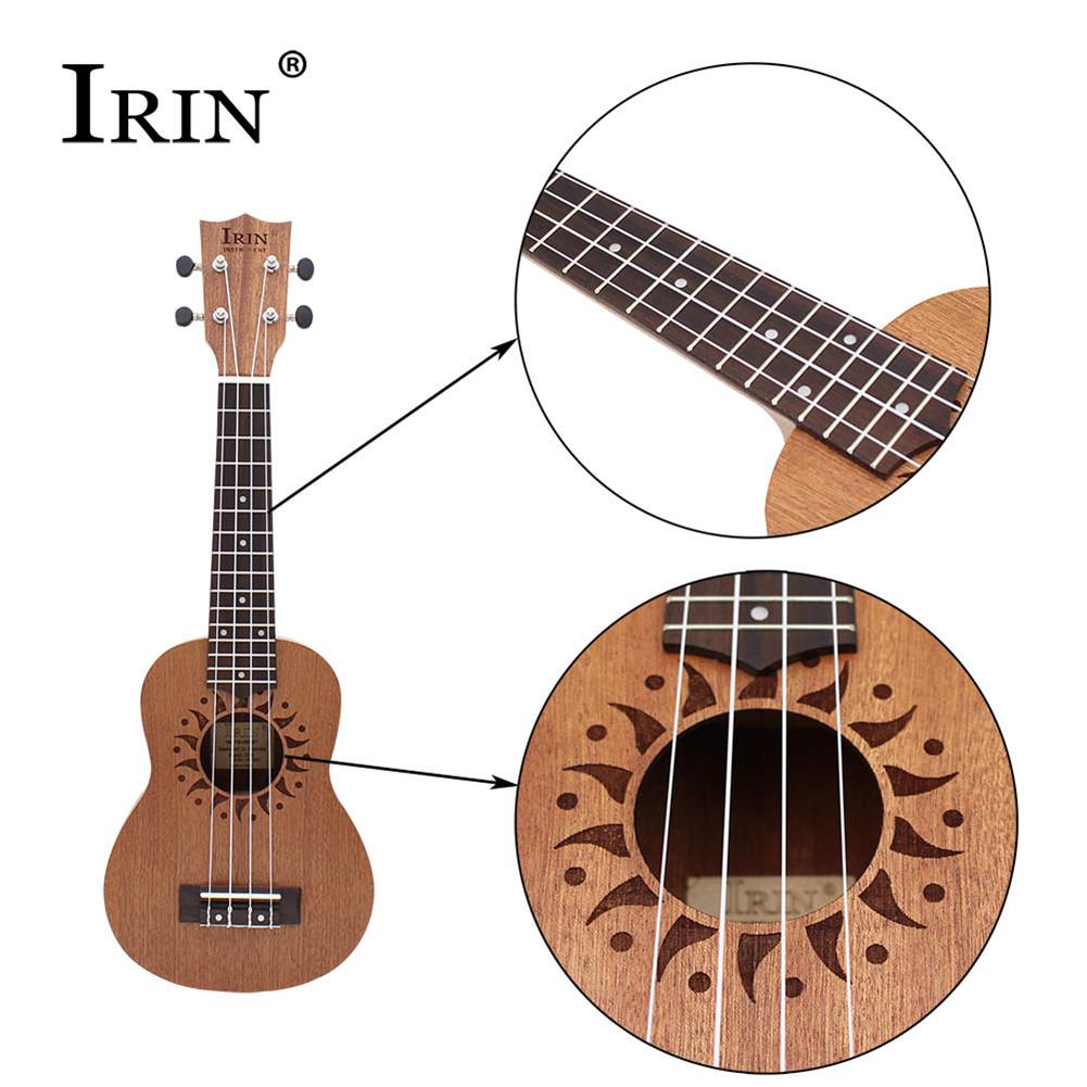IRIN 21inch Ukulele Sapele Wood Flower Sound Hole 15 Fret Four Strings Guitar+Bag+String+Capo+Strap