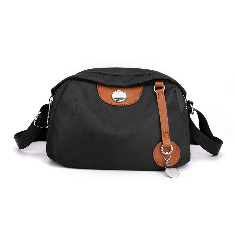 Nylon dames waterdichte grote capaciteit crossbody tas casual effen kleur messenger schoudertas: Black