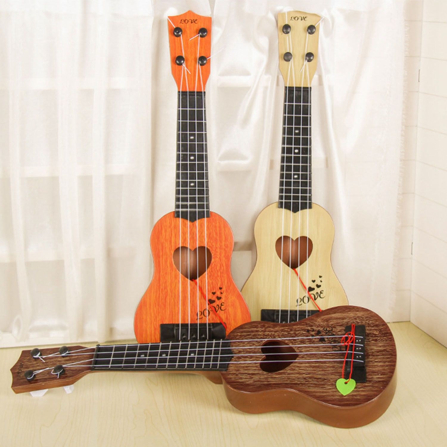 Muziekinstrument Mini Ukulele Kids Gitaar Speelgoed Creatieve School Play Game Kleur Willekeurige