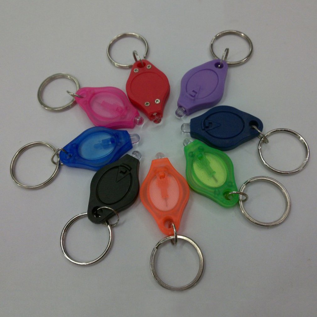 Portable Mini Size Keychain Squeeze Light Micro LED Flashlight Torch Bags Key Ring