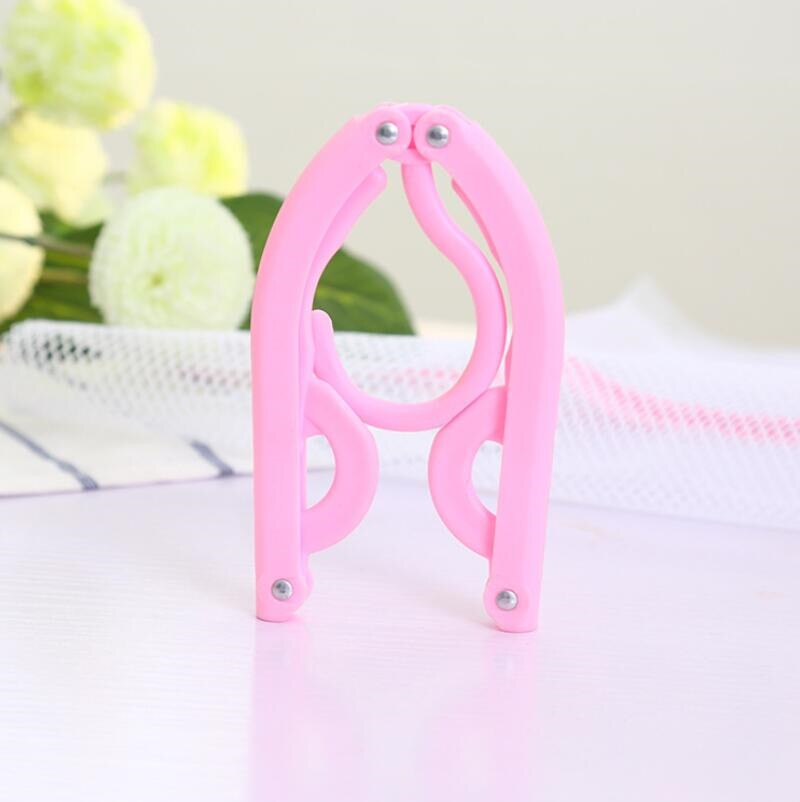 5Pcs Portable Travel Cloth Hanger Plastic Foldable Rack Drying Clothespin Trouser Coat Towel Socks Storage Closet Organizer: Pink
