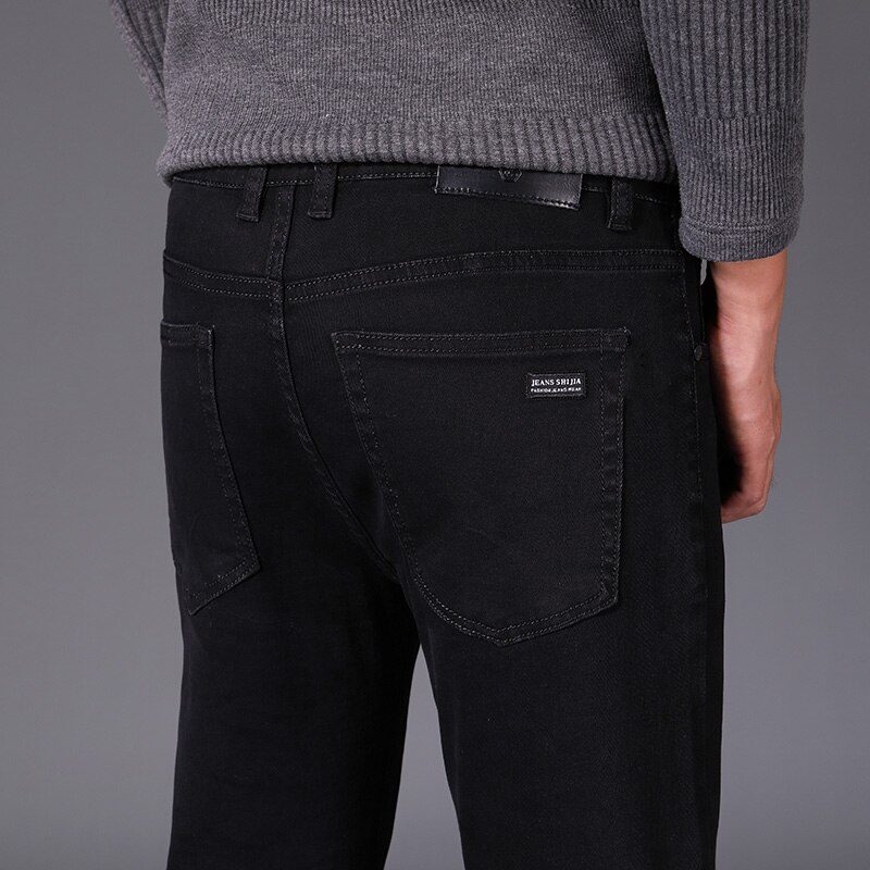 Black plus velvet men's business casual jeans Classic loose soft cotton trousers winter Warm pants