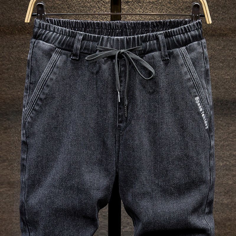 Svarta stora jeans herr plus size college haremsbyxor höst elastiska stretch fötter byxor 7xl 6xl 5xl