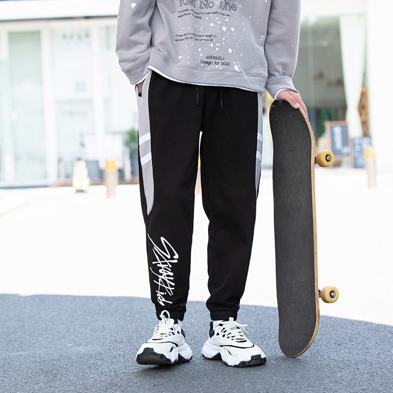 Streetwear løse mænd bukser udendørs sportsbukser ankel bundet mellem talje elastik mandlig hip-hop bogstav efterår lange bukser