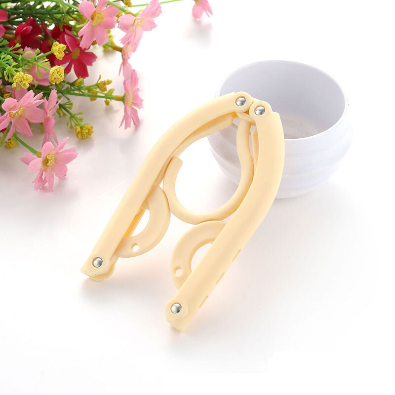 Portable Folding Clothes Hanger Multifunction Magic Stretch Drying Rack Home Wardrobe Storage Rack Women Travel Clothes Hanger: Beige