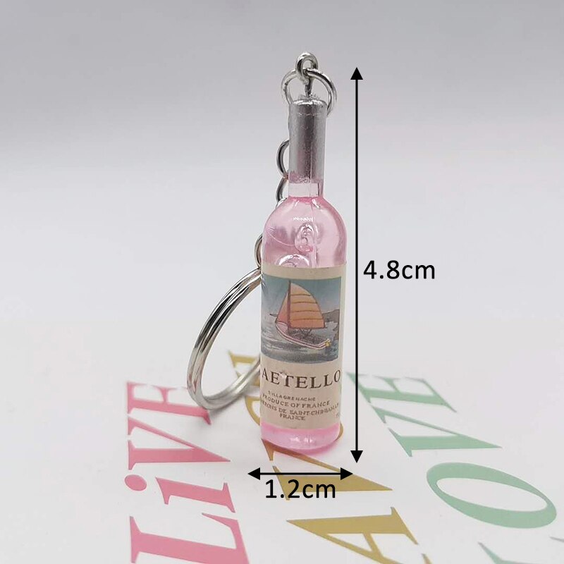 1 stk ølvinflaske nøglering vedhæng tiltrædelser bryllupsfest til kvinder mænd akryl bil taske nøglering multi formål: Lyserød