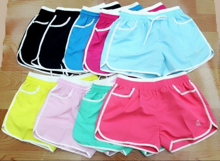 Pantalones populares de Color liso para mujer, pantalones Playeros de piel de durazno y terciopelo de estilo coreano, pantalones cortos de playa de informales y deportivos para mujer