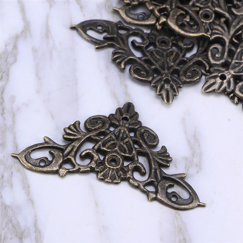 12 sztuk retro ochraniacz narożny DIY metal zatrzymać cynkowy ochraniacz narożny robić ramki na zdjęcia Scrapbooking zeszyt (4.8x3.5cm)