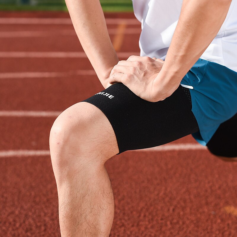 Aonijie mænd kvinder kompression lår ærme justerbar benbøjle support ombryder sportsskade opsving til løbebasket