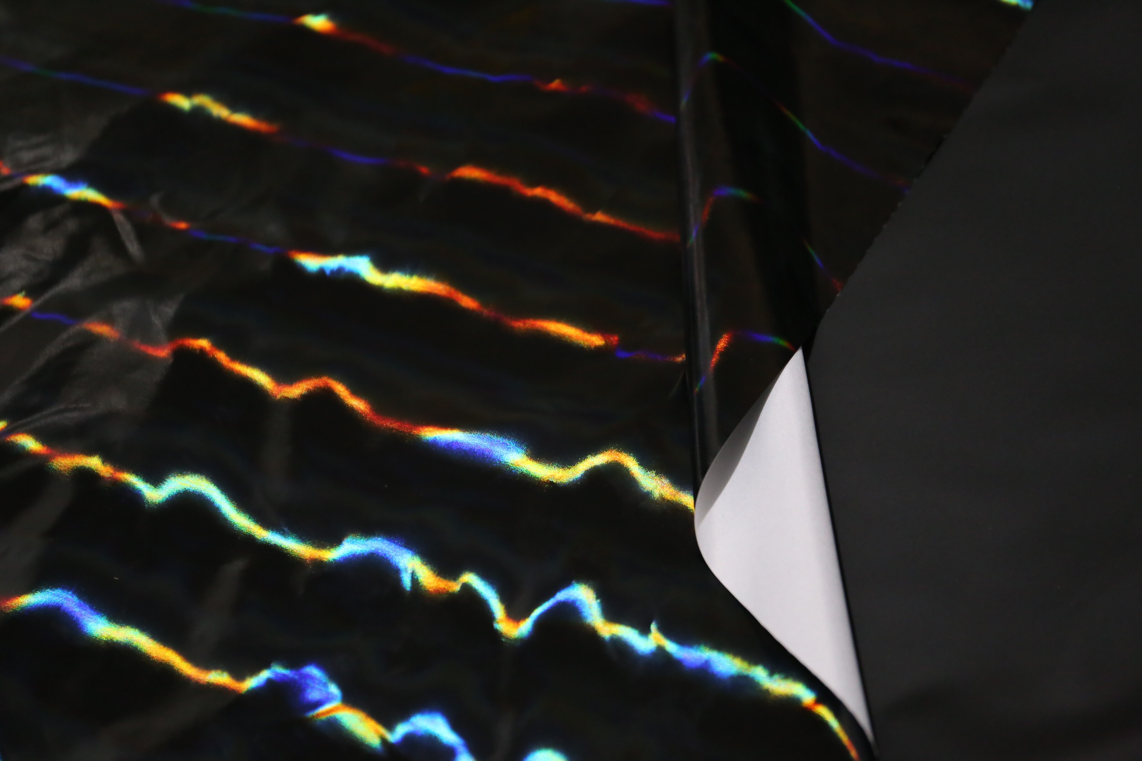 Su Fuer-Película de arco iris pu, espejo mágico negro, ropa reflectante, impermeable, chaqueta de cuero, tela 20-5