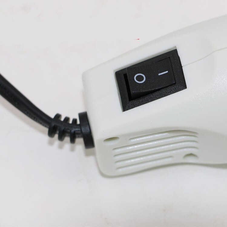 utilisation de pistolet à chaleur électrique outil électrique température de l'air avec siège de soutien rétrécissement plastique Fimo Dinks