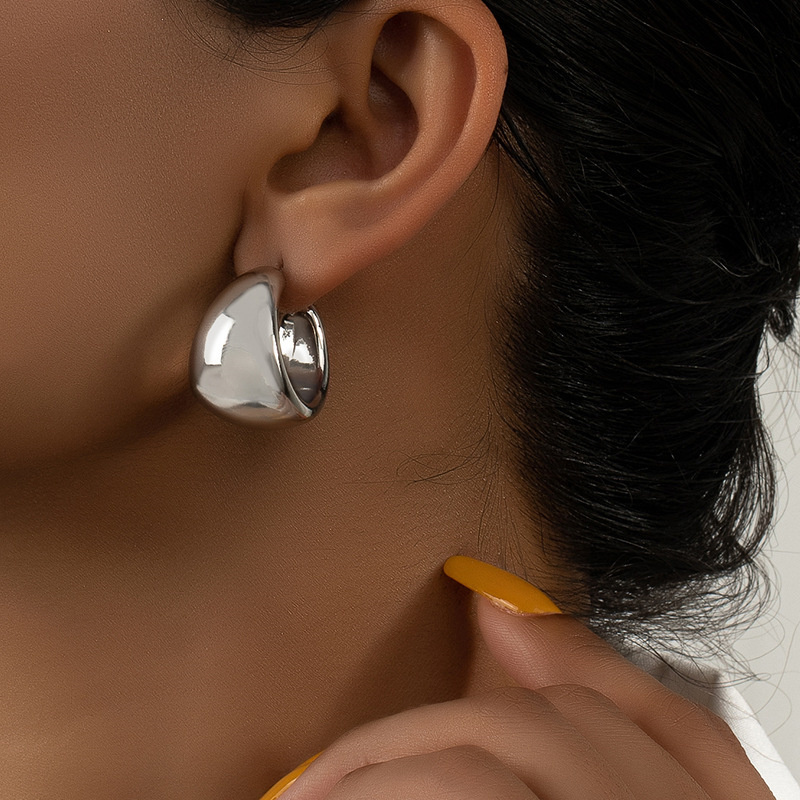 Pendiente de aro con giros circulares para mujer, temperamento Simple, hipérbole, Color dorado, uso diario, joyería, de: PLATEADO