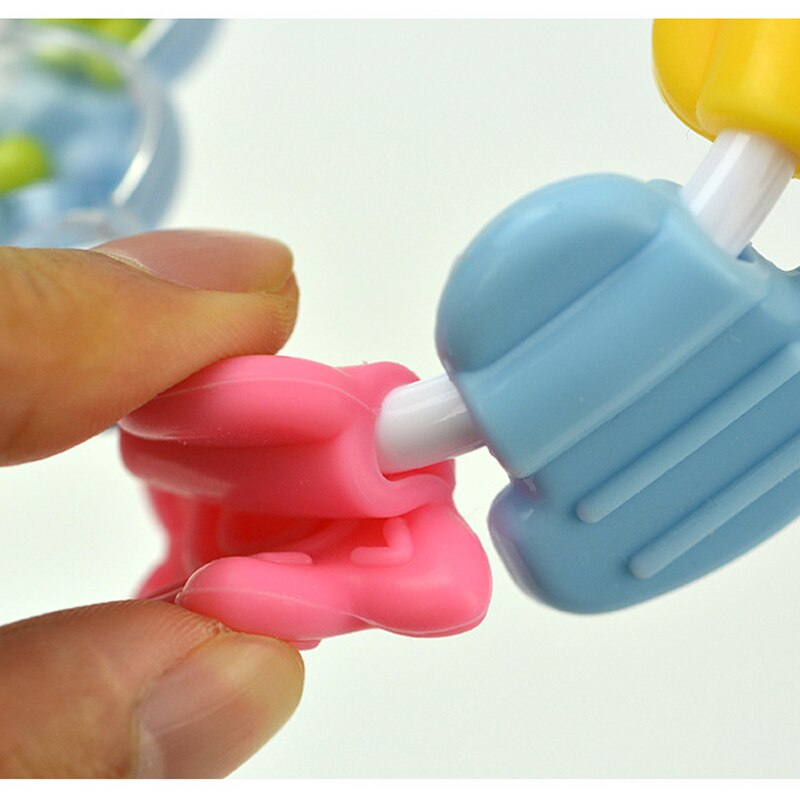 Ryste rangle baby-lillebørnes legetøj med blødt silikone vedhæftning pædagogisk armbånd legetøj til at tygge nyfødt baby 3+