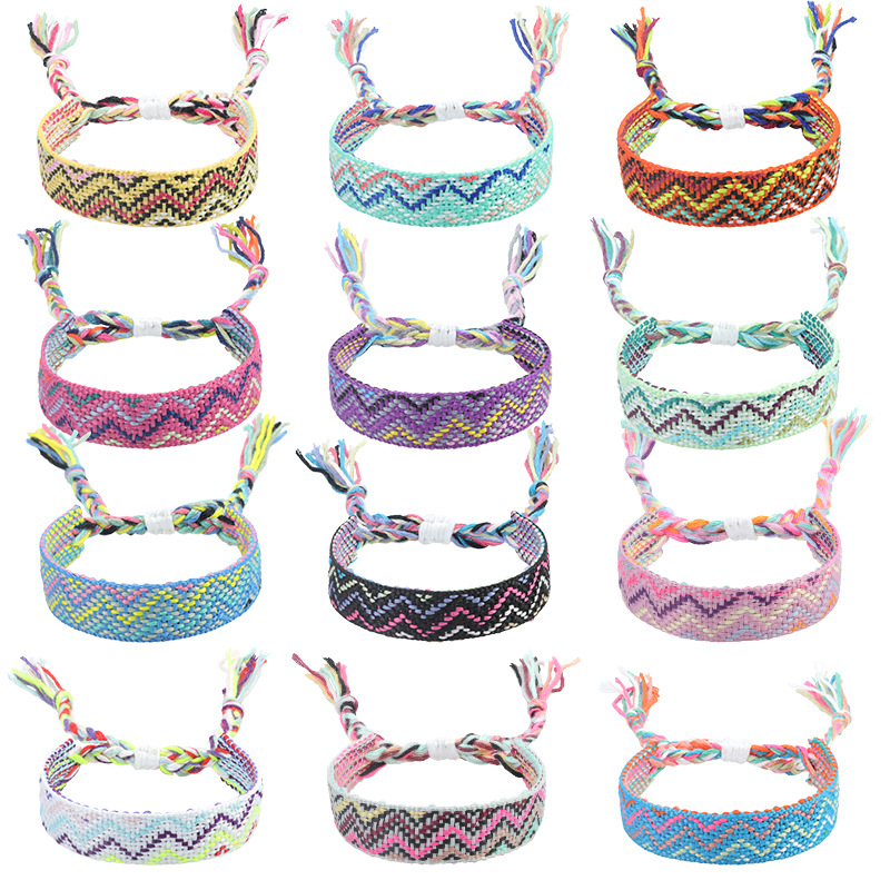 Nepal etnico tessuto braccialetto fatto a mano amicizia treccia corda tessuto cinturino a mano ricamo braccialetto nappe coppia Boho Wrap donna uomo
