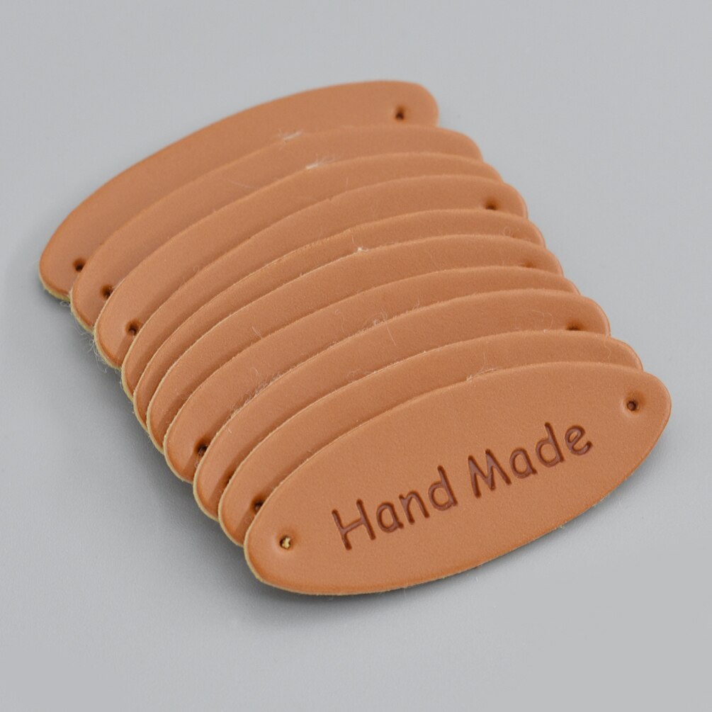 50Pcs/lot Handmade Clothes Labels Embossed Hand Made Letter Garment Labels For Bags Diy Sewing Materials: Olive shape