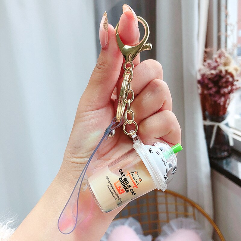 Neue Karikatur Nette Katze Auto Keychain Kreative Milch Tee Tasse Flüssigkeit Kristall Treibsand Pailletten Schlüssel Ring Tasche Anhänger für Frauen tasche Schlüssel C: Elfenbein