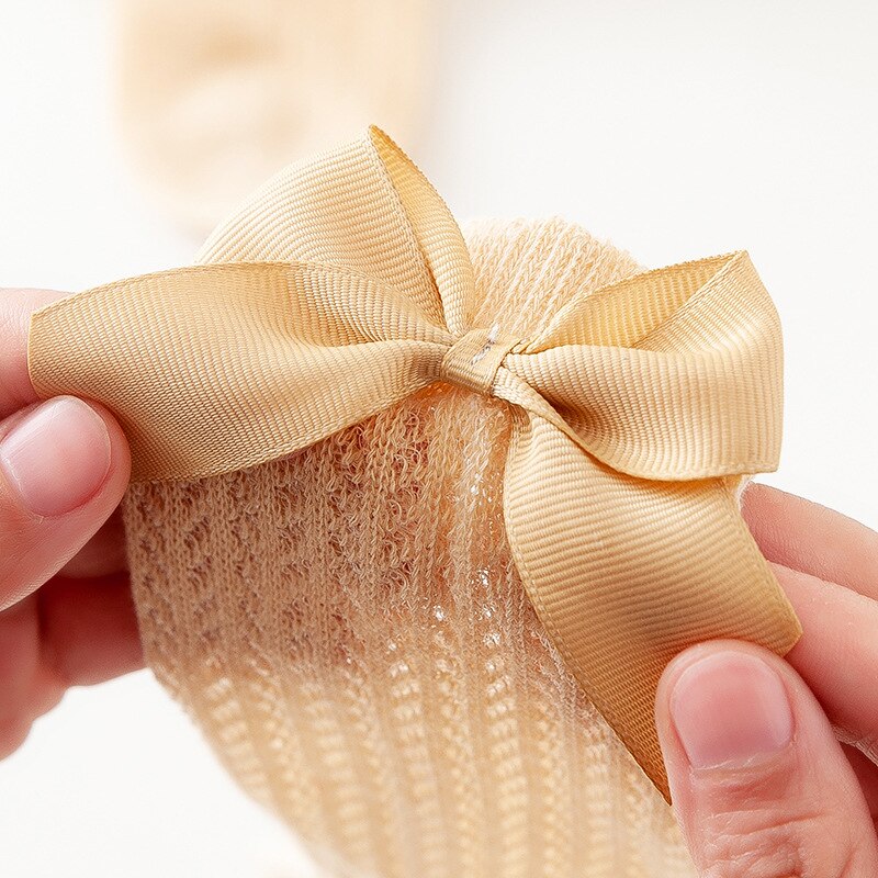 5 sztuk/partia dla dzieci dziewczyny słodkie cukierkowe kolory łuk kolana wysokie skarpetki maluszek mały Bowknot w rura skarpetki dzieci drążą skarpetki