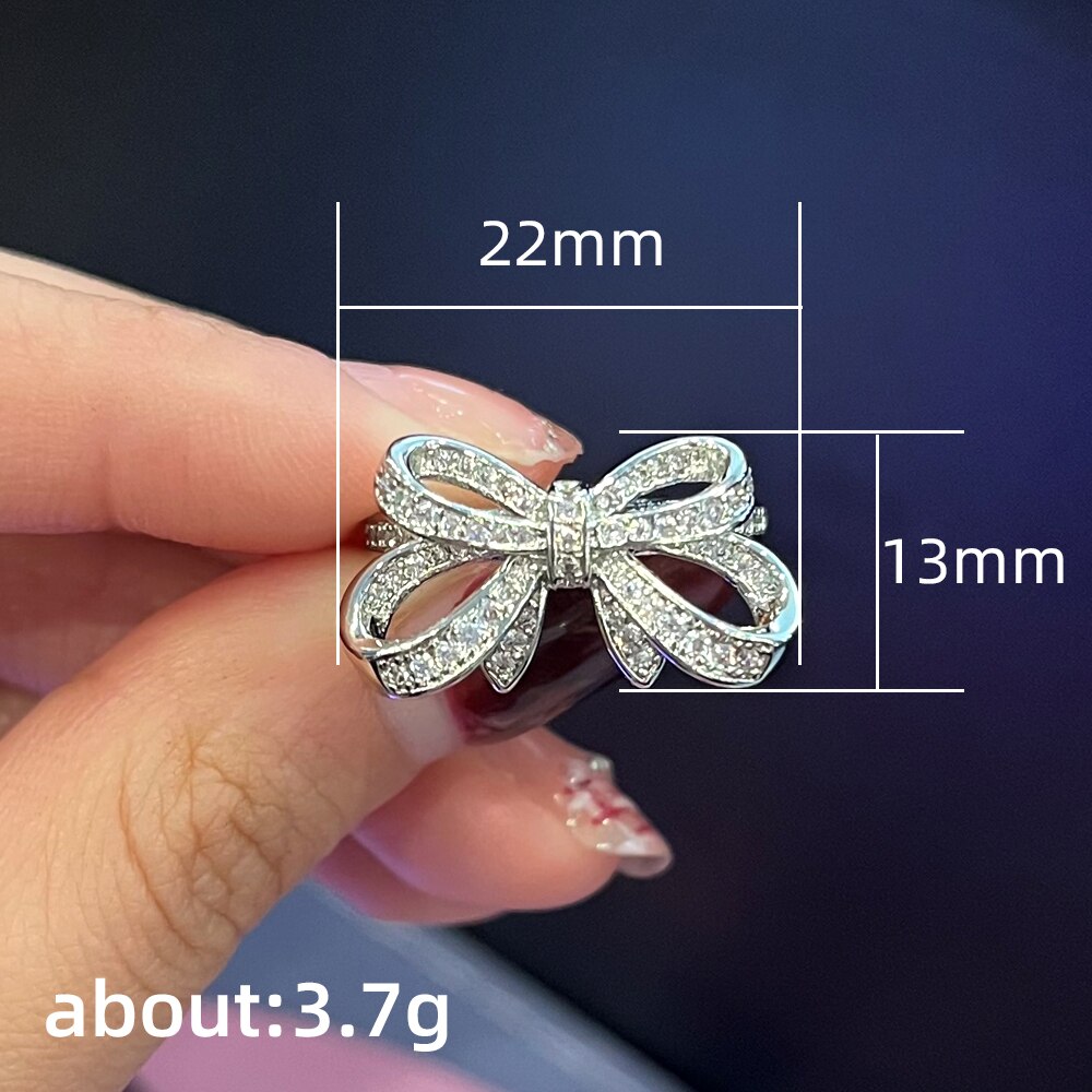 Huitan 2022 Boog Ringen Voor Vrouwen Volledige Dazzling Cz Mode Luxe Vrouwelijke Vinger Accessoires Engagement Wedding Bands Sieraden