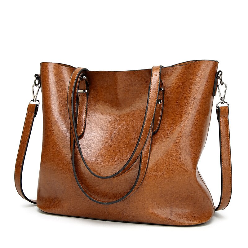 Bolso de hombro de cuero de estilo Retro, bolso sencillo con borla, bolso portátil de tendencia, bolso de lujo para mujer, bolso informal para mujer