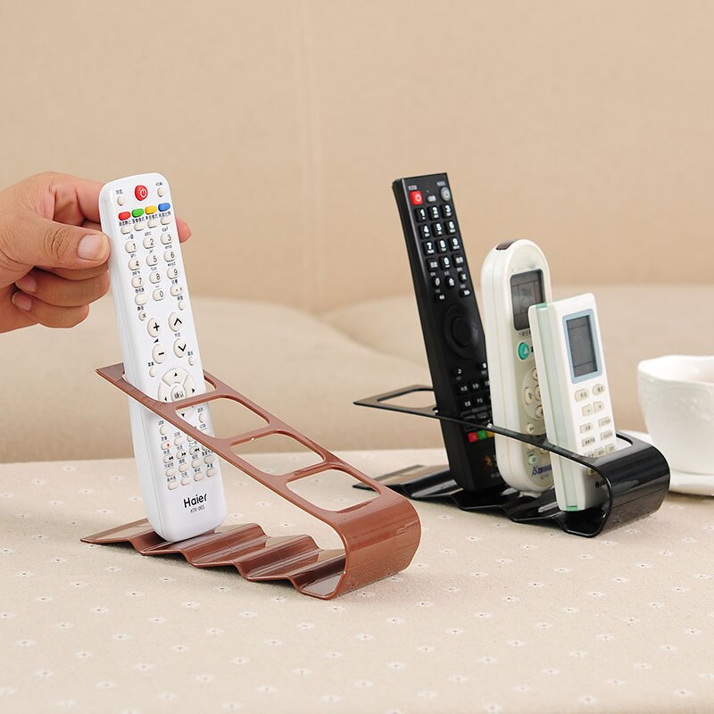 Soporte de plástico para TV, DVD, práctico marco de cuatro mandos a distancia, soporte para teléfono móvil, estante de hasta 4 unidades
