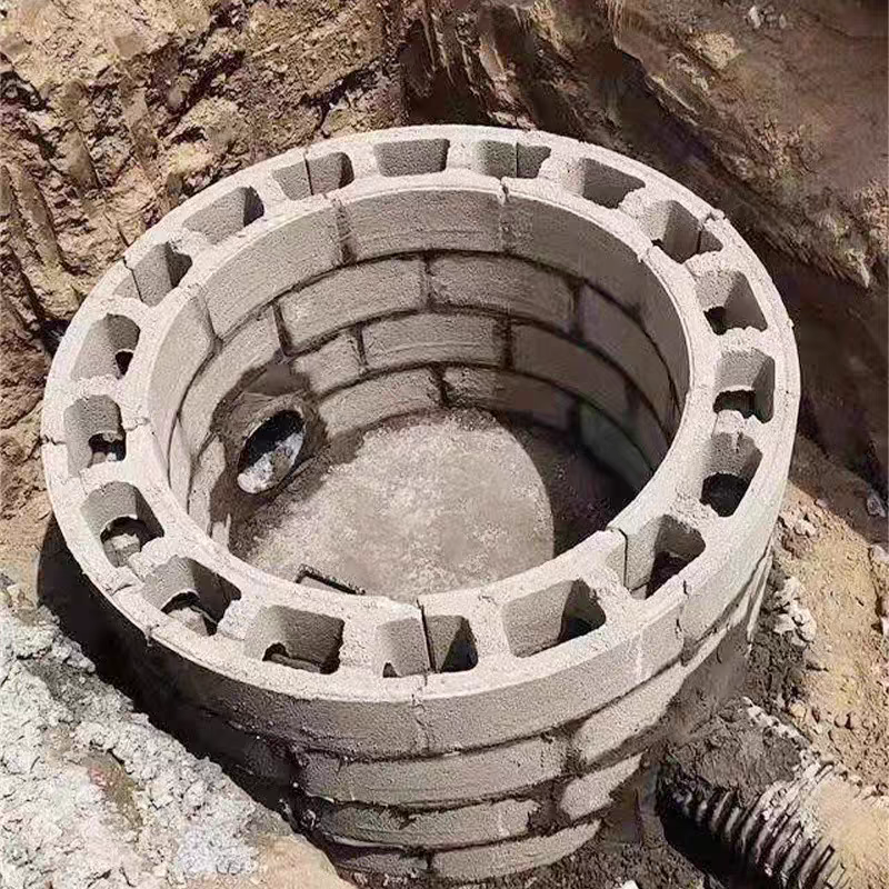 Boîte technique circulaire de moule de puits en béton, inspection de moule en plastique de brique, nuit au sol