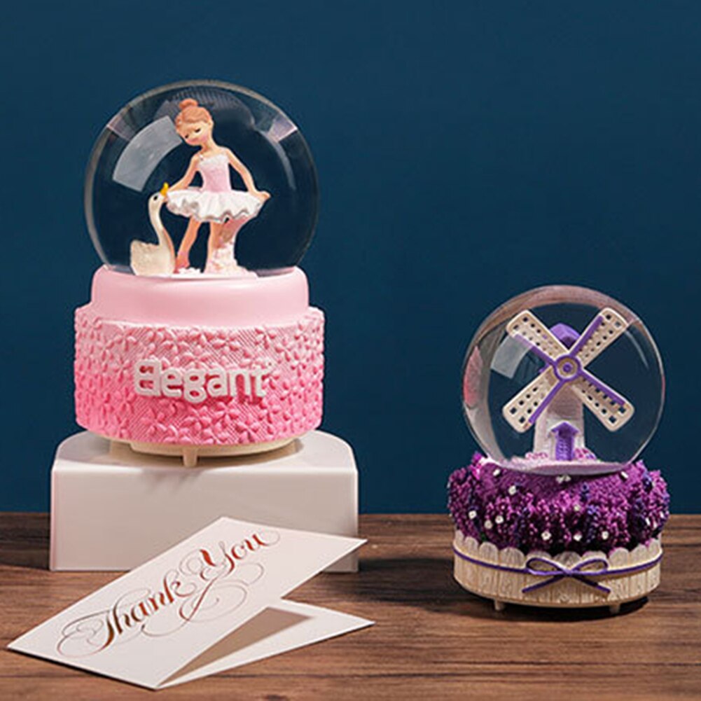 Nieve cayendo nieve caja de música de molino de viento caja de música con forma de bola de cristal con púrpura lavanda Base de escritorio decoración