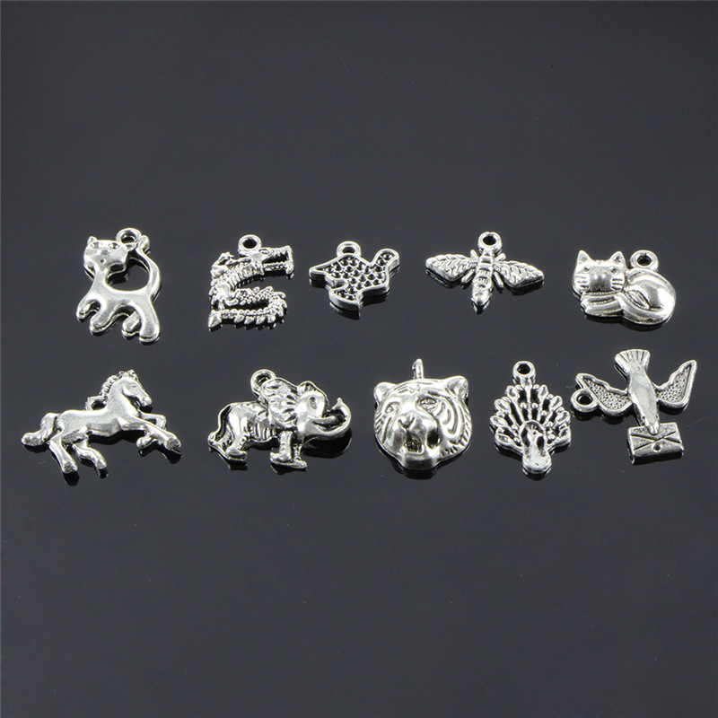 Neue Retro Silber 100 stücke Masse Verlost Mix Tier Charm Anhänger DIY Schmuck