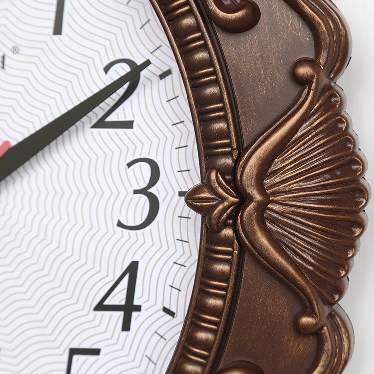 Gorgeous retro style Spanish style wall clock living room hall wall clock 13.3-inch oval imitation mirror clock