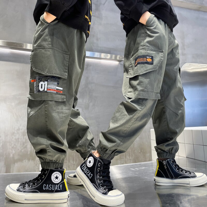 New Fashion Joggers pantaloni Cargo ragazzi pantaloni Harem stampa multi-tasca pantaloni sportivi per bambini grandi pantaloni Hip-Hop Streetwear pantaloni Casual