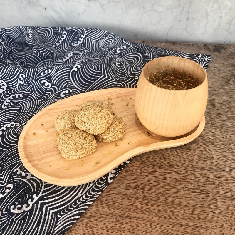 Delad fruktfat i japansk stil dim sum tårta träfat fat frukost tallrik servis