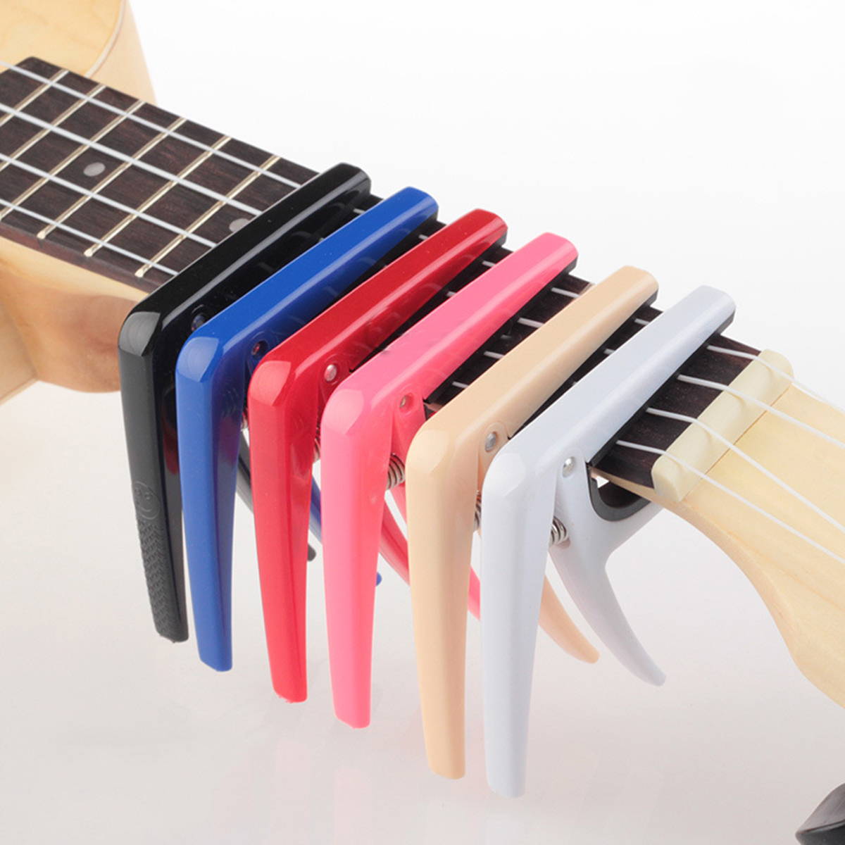 Clip-on ukulele capo clip telefonholder holder 2- i -1