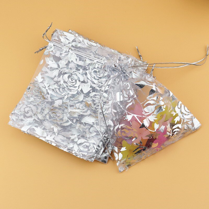 100 stuks/partijen sieradenverpakkingen, organza garen zakjes, net zakjes, gouden stempel snoepkleurige trekkoord bedankjes zakjes