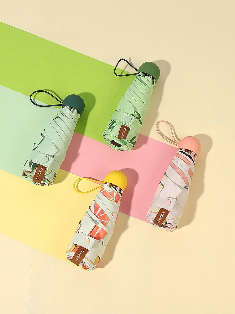 Capsule paraplu fruit zonnebrandcrème mini tas paraplu.