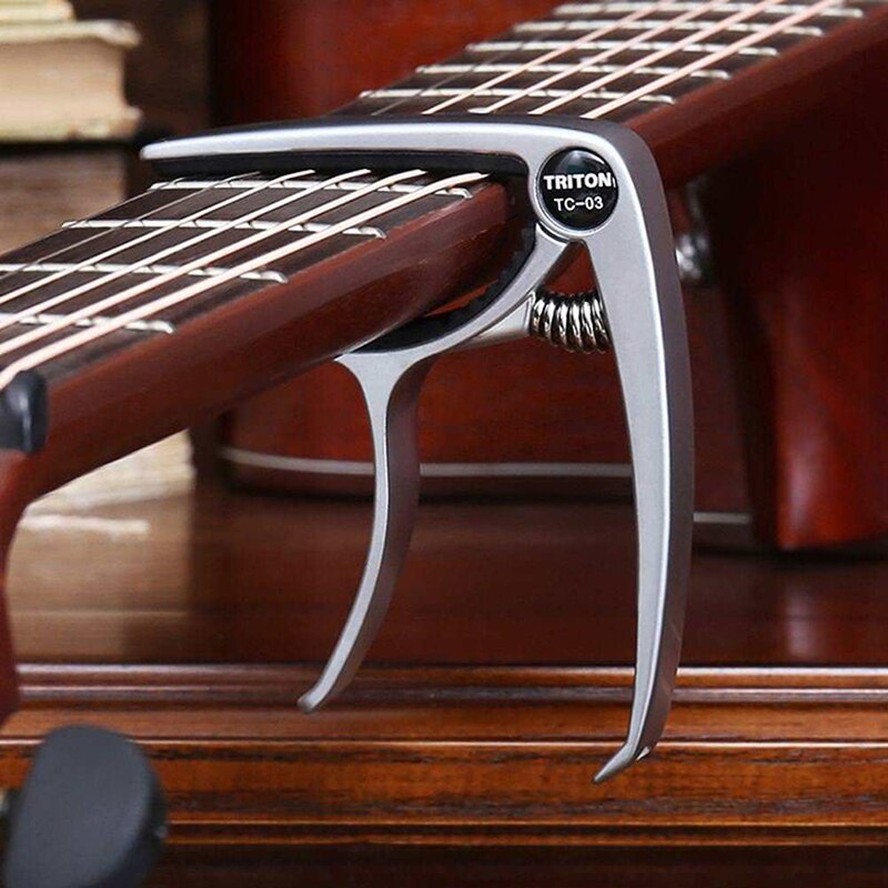 Accesorios universales para guitarra Capo, llave de cambio rápido, Metal de aleación de aluminio, cejilla para guitarra clásica acústica, piezas para guitarra: Plata