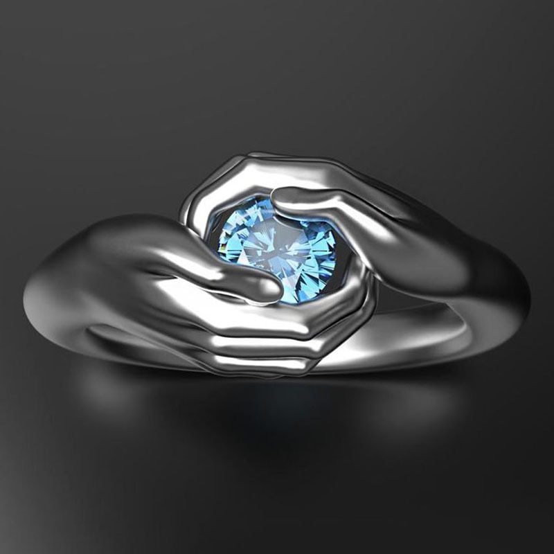 Anello di zircone di cristallo blu tenuto in mano di Design unico per le donne regalo di san valentino classico coppia abbraccio anello di fidanzamento di nozze gioielli