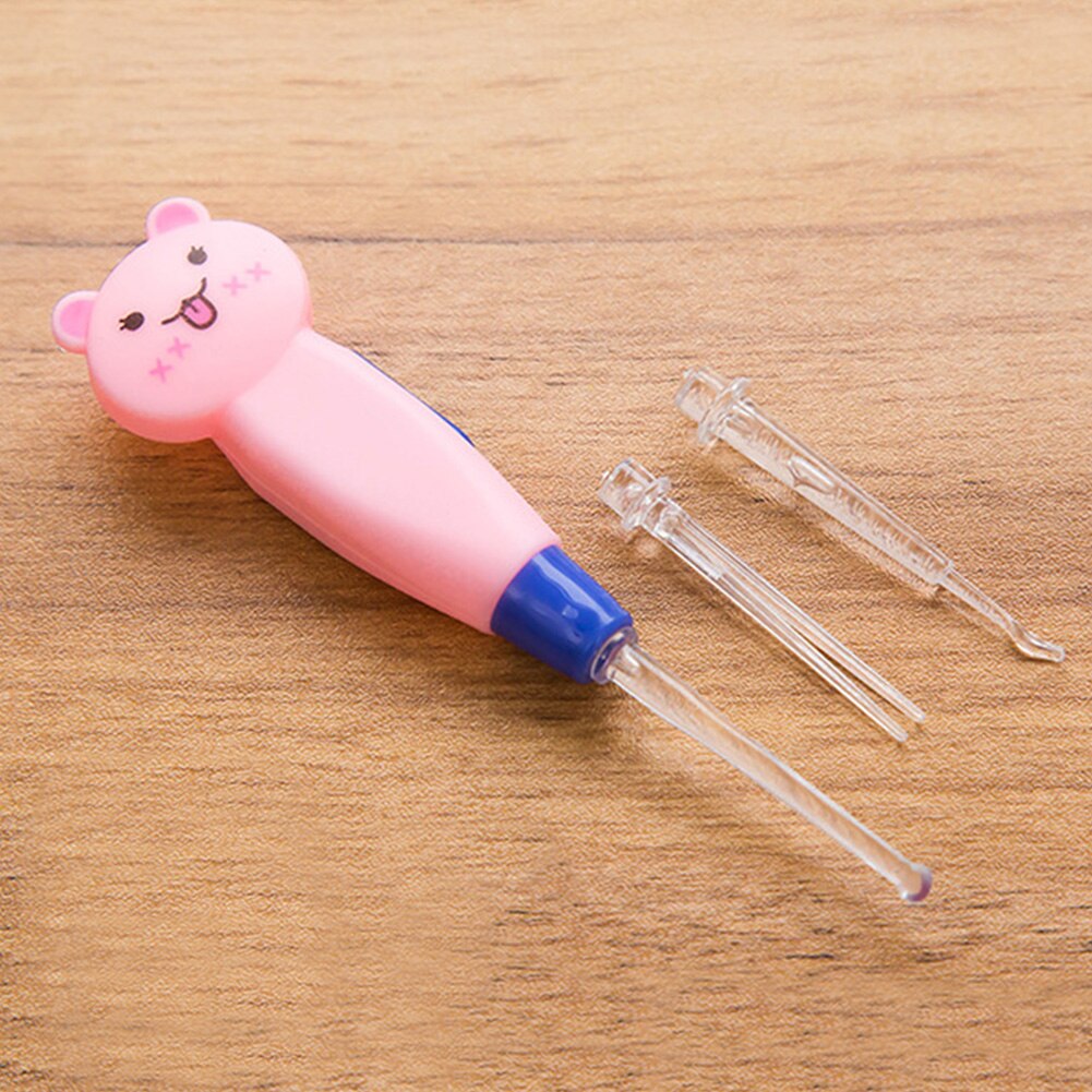 Baby vuxna bryr sig öron rengöring med lätt öronvax sked gräver lysande gräva örat spruta japansk stil